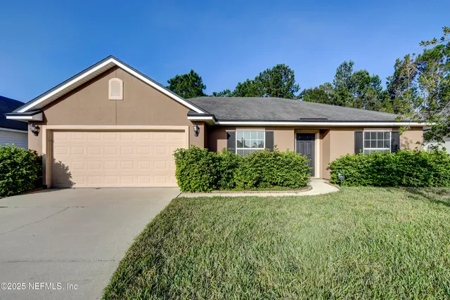 a view of backyard of house