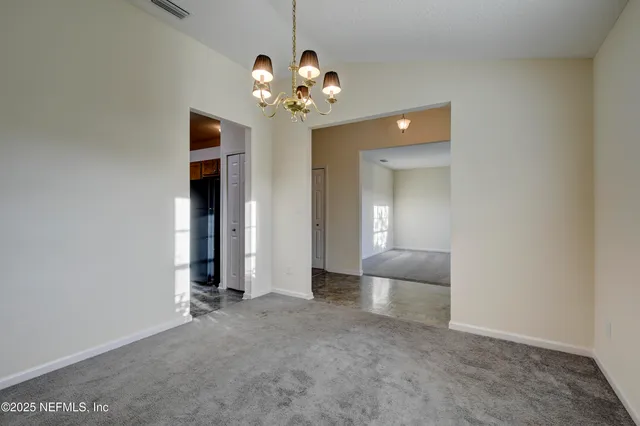 en view interior of a house and chandelier fire place