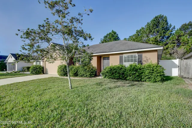 a house view with a garden space