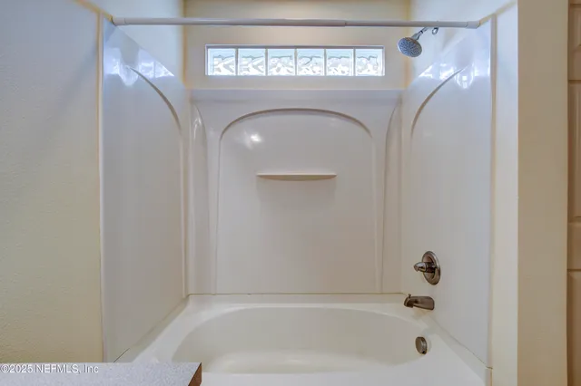a bathroom with a bathtub