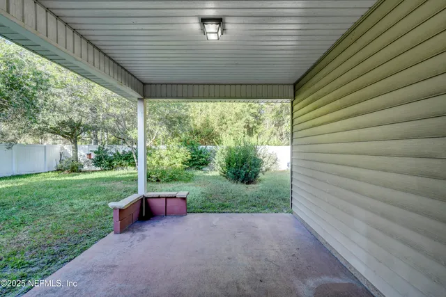a view of backyard with green space