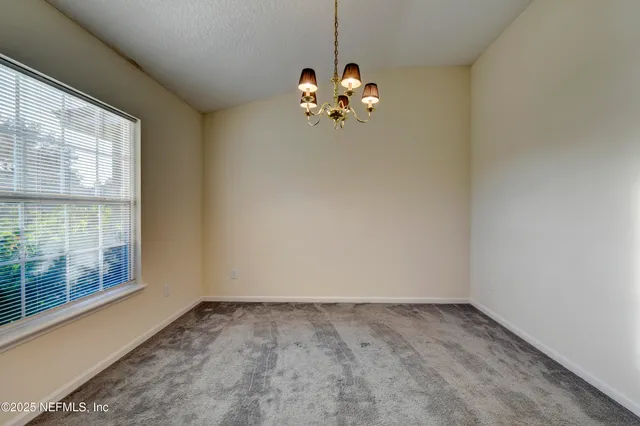 a view of a room with a window