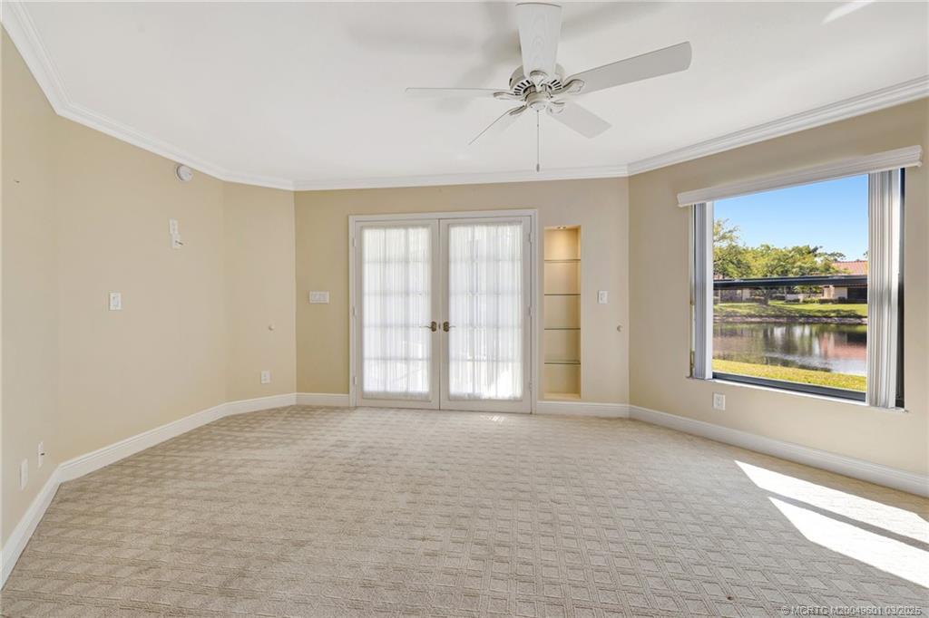 6040 Southeast Martinique Drive, Unit 102 Stuart, FL 34997 - Photo 24 of 52 a view of an empty room with a window