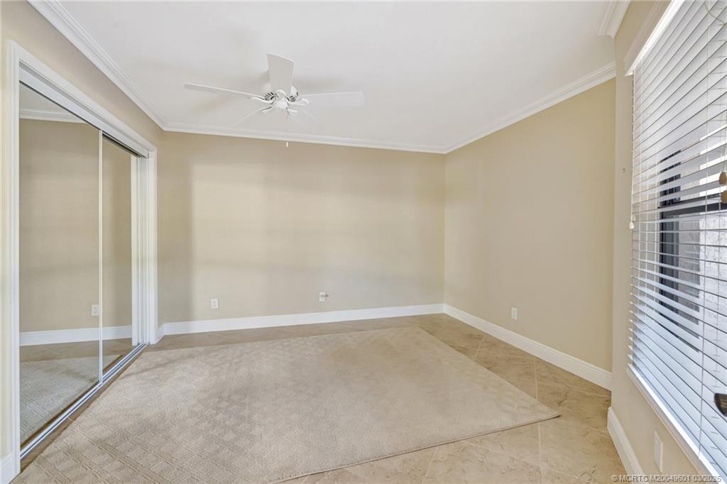 6040 Southeast Martinique Drive, Unit 102 Stuart, FL 34997 - Photo 30 of 52 a view of an empty room