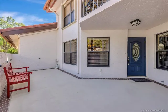 a front view of a house with garage