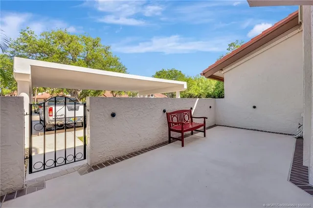 a view of hallway with wooden floor