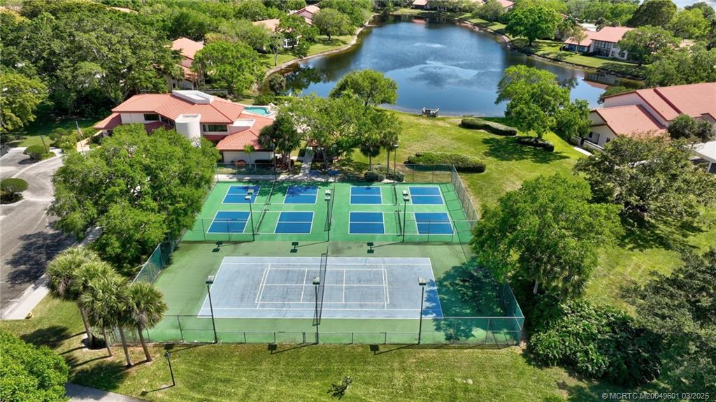 6040 Southeast Martinique Drive, Unit 102 Stuart, FL 34997 - Photo 52 of 52 an aerial view of a house