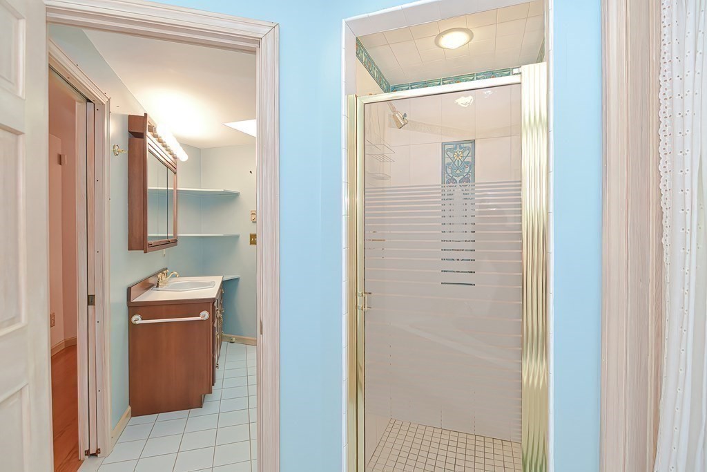 125 Westboro Road Upton, MA 01568 - Photo 26 of 41 a bathroom with a sink a toilet and shower