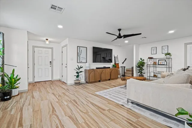 a room with furniture and a large window