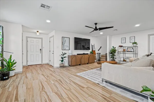 a room with furniture and a large window