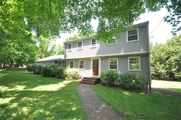 17 Middle Street Lexington, MA 02421 - Photo 1 of 13 a front view of house with yard and green space