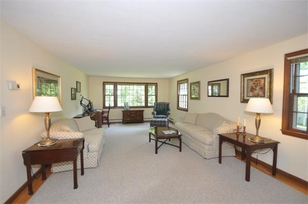 17 Middle Street Lexington, MA 02421 - Photo 2 of 13 a living room with furniture and a lamp