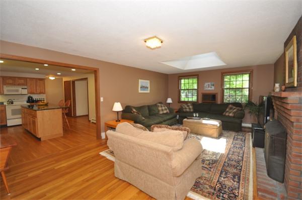 17 Middle Street Lexington, MA 02421 - Photo 6 of 13 a living room with furniture and a flat screen tv