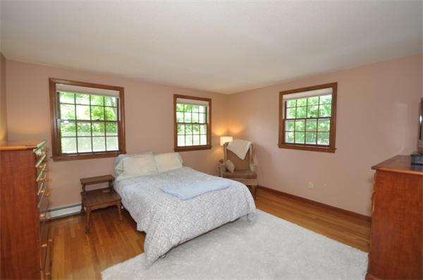 17 Middle Street Lexington, MA 02421 - Photo 9 of 13 a bedroom with a bed and window