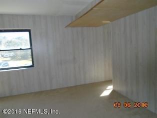 87638 Roses Bluff Road Yulee, FL 32097 - Photo 8 of 19 a view of a window in an empty room