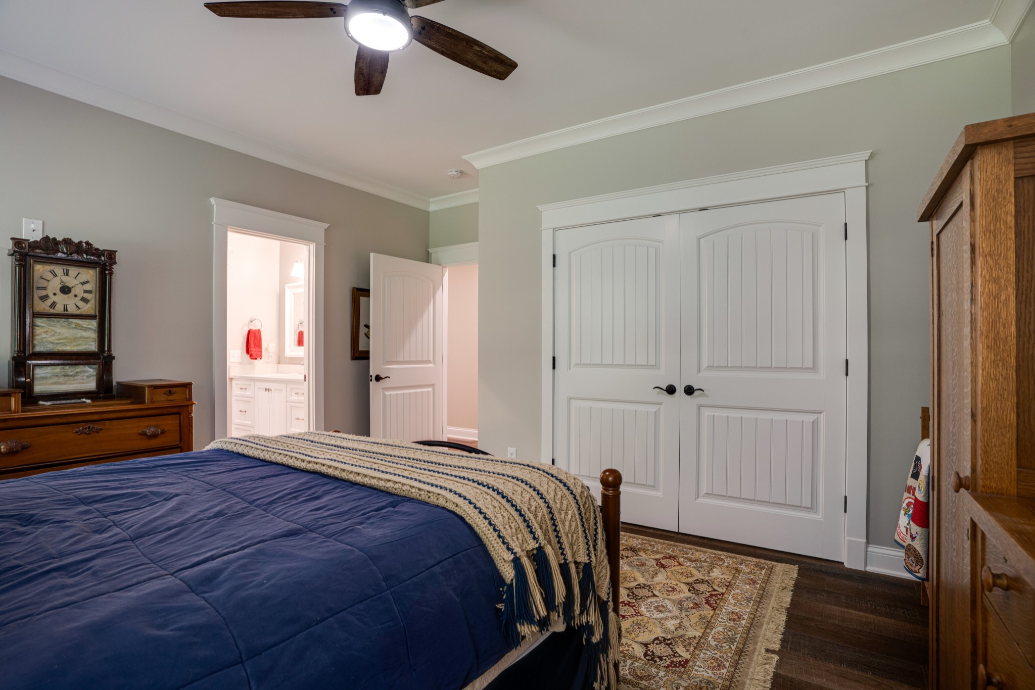 4454 Clarence Murphy Road Springfield, TN 37172 - Photo 25 of 44 a bedroom with a bed and a chandelier