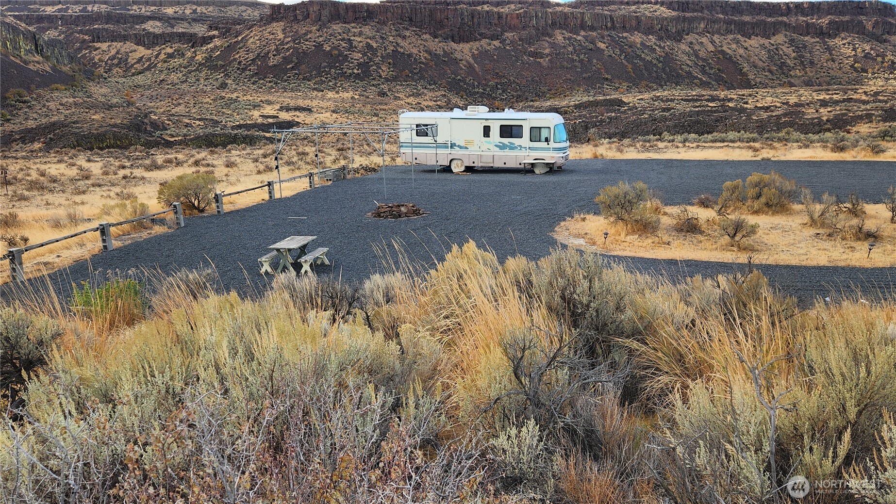 a view of a lake with a mountain in the background