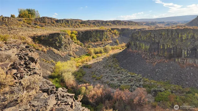a view of a lake with mountain