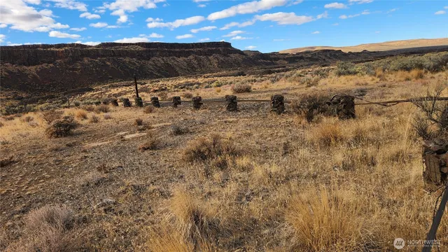 a view of a lake with mountains in the background