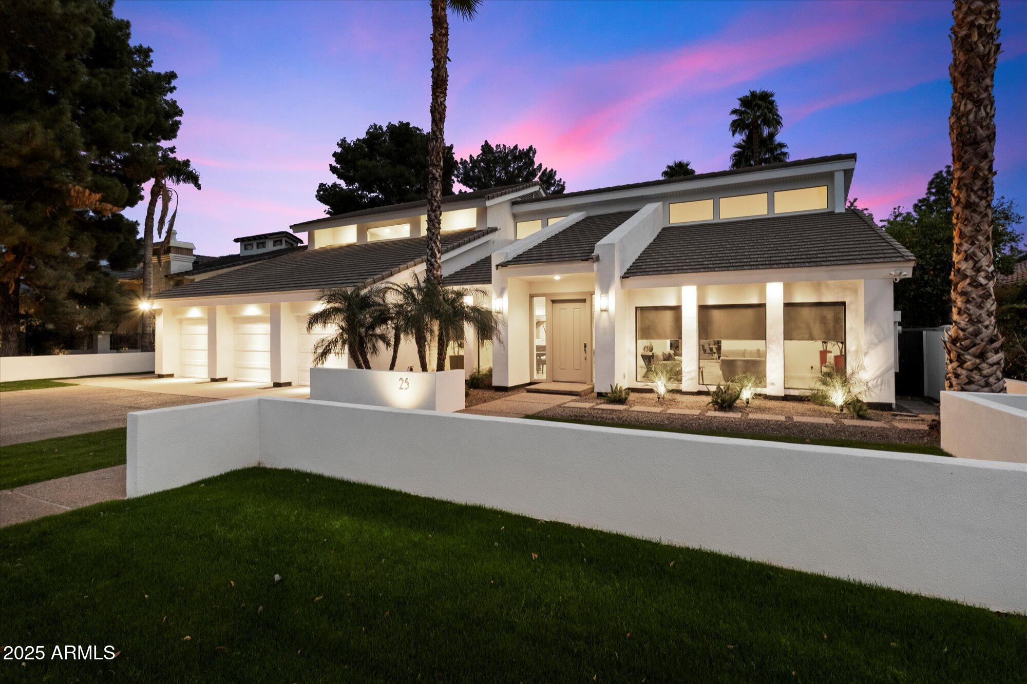 25 West Frier Drive Phoenix, AZ 85021 - Photo 1 of 43 a front view of a house with a yard