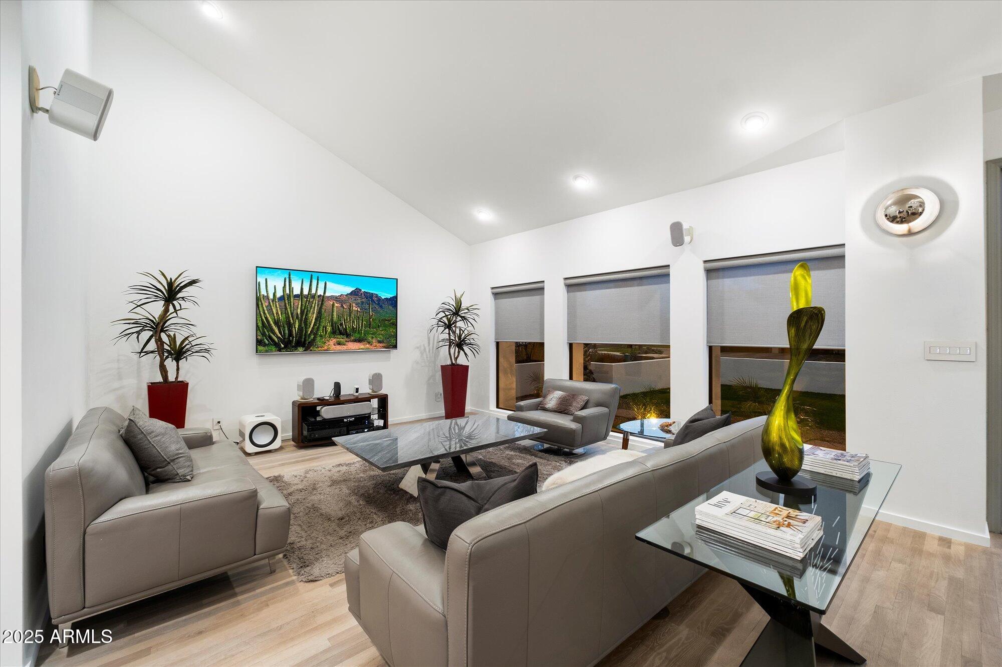 25 West Frier Drive Phoenix, AZ 85021 - Photo 10 of 43 a living room with furniture and a flat screen tv
