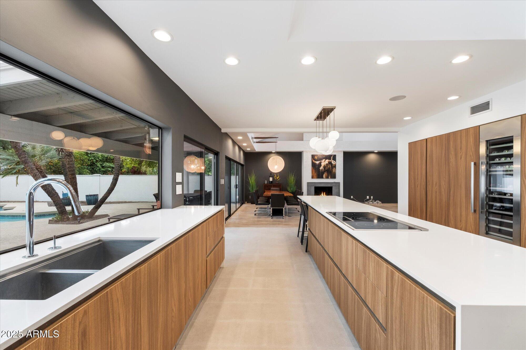 25 West Frier Drive Phoenix, AZ 85021 - Photo 14 of 43 a large white kitchen with a large window