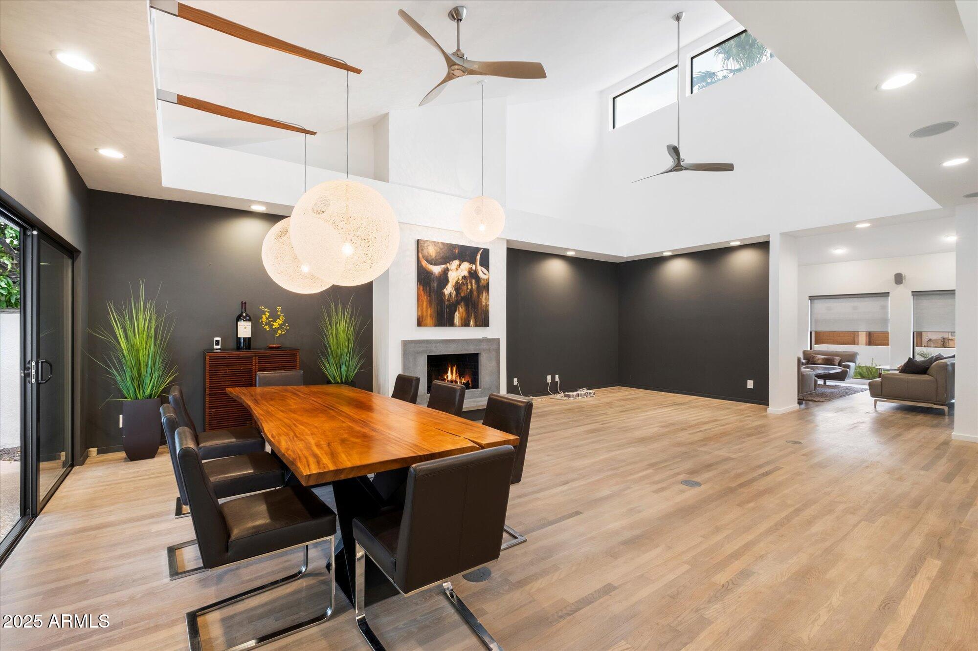 25 West Frier Drive Phoenix, AZ 85021 - Photo 15 of 43 a living room with furniture a flat screen tv and kitchen view