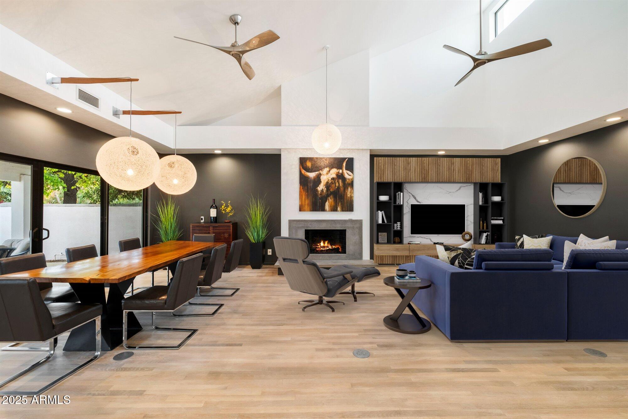 25 West Frier Drive Phoenix, AZ 85021 - Photo 17 of 43 a living room with fireplace furniture and a large window