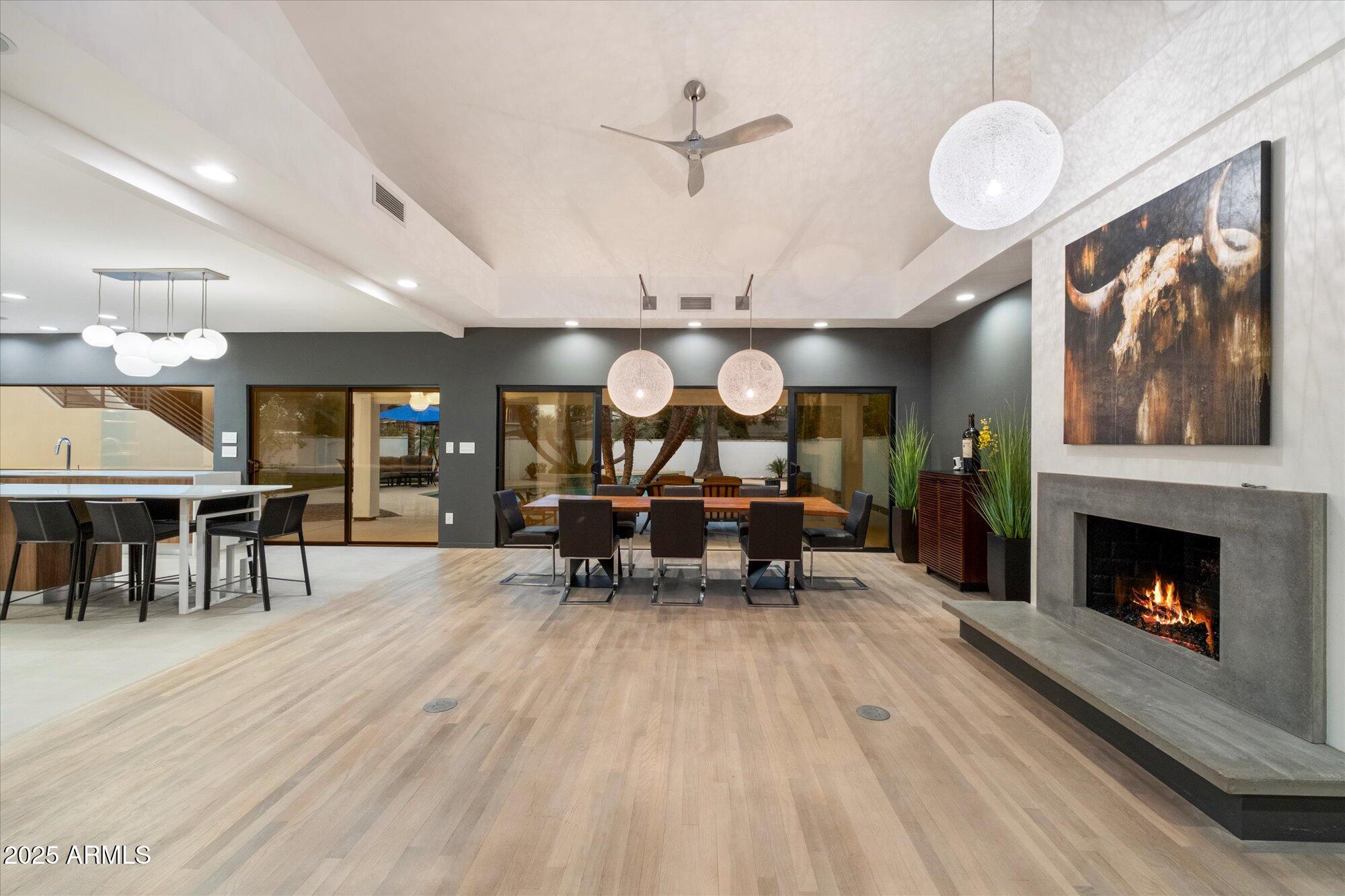 25 West Frier Drive Phoenix, AZ 85021 - Photo 18 of 43 a living room with furniture a fireplace and a table