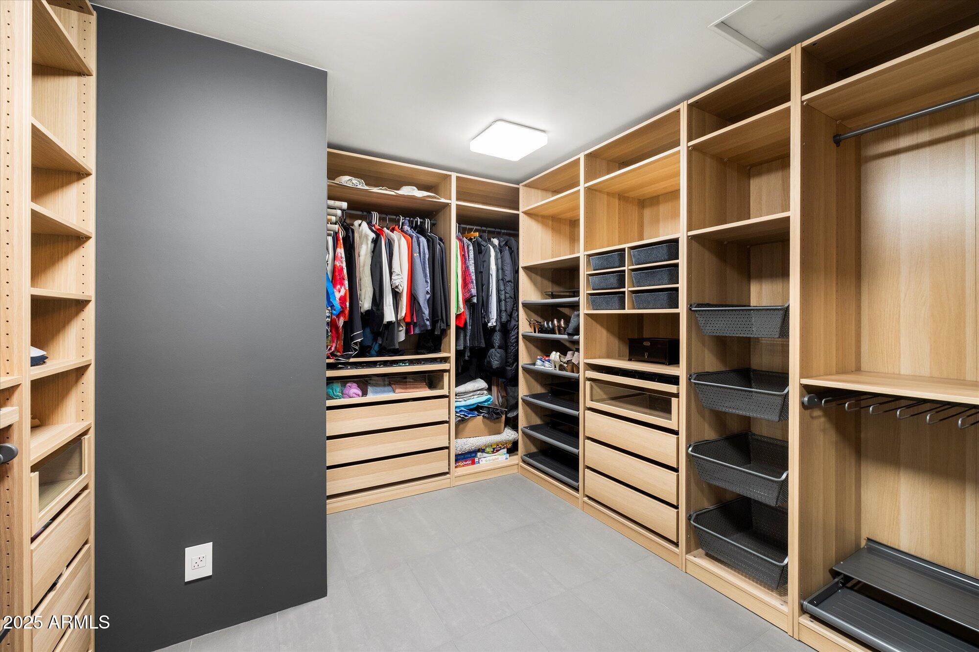25 West Frier Drive Phoenix, AZ 85021 - Photo 26 of 43 a view of walk in closet with empty racks