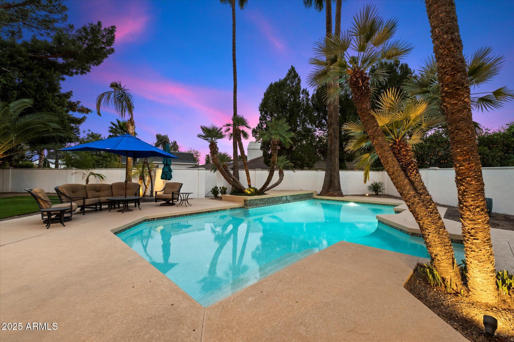 25 West Frier Drive Phoenix, AZ 85021 - Photo 38 of 43 a view of a swimming pool with a patio