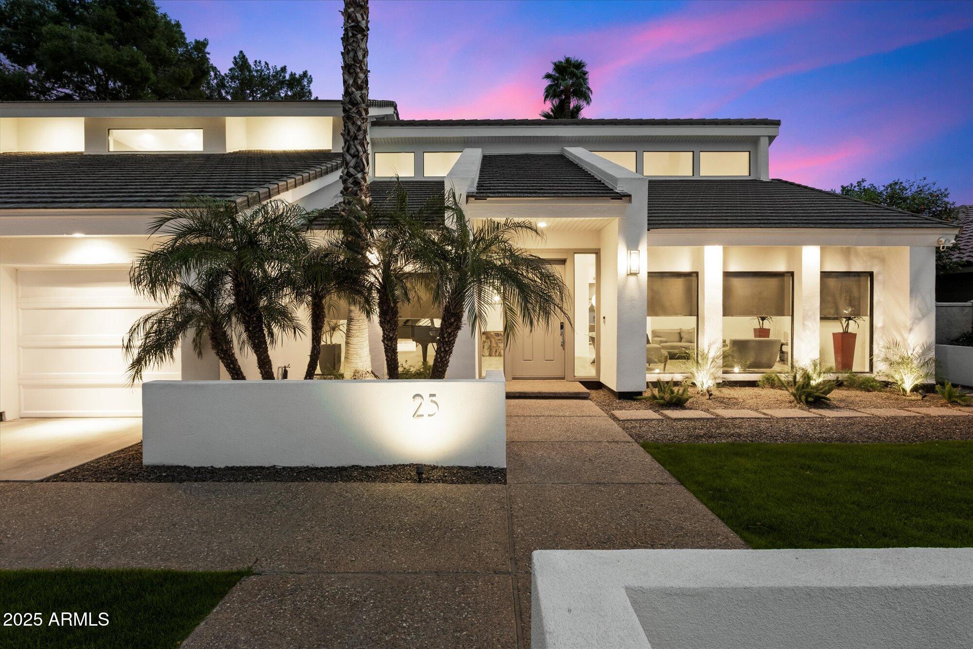 25 West Frier Drive Phoenix, AZ 85021 - Photo 41 of 43 a front view of a house with a yard