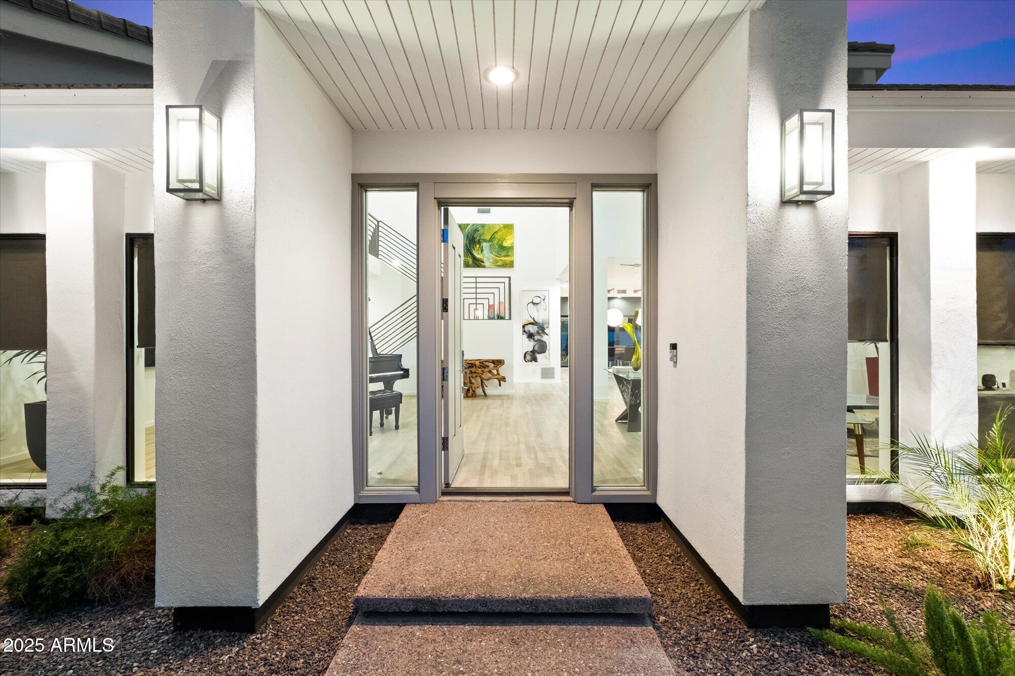 25 West Frier Drive Phoenix, AZ 85021 - Photo 5 of 43 a view of hallway with wooden floor and livingroom view