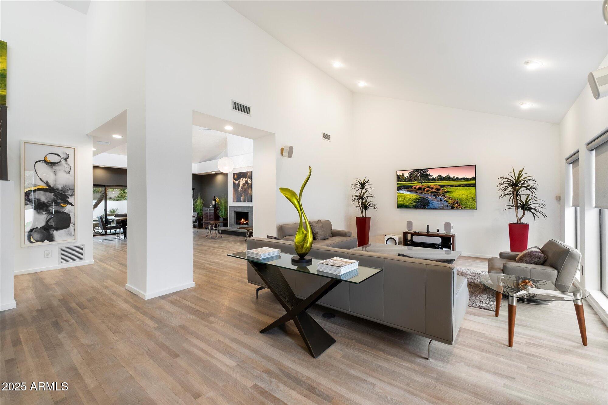 25 West Frier Drive Phoenix, AZ 85021 - Photo 8 of 43 a living room with furniture and wooden floor