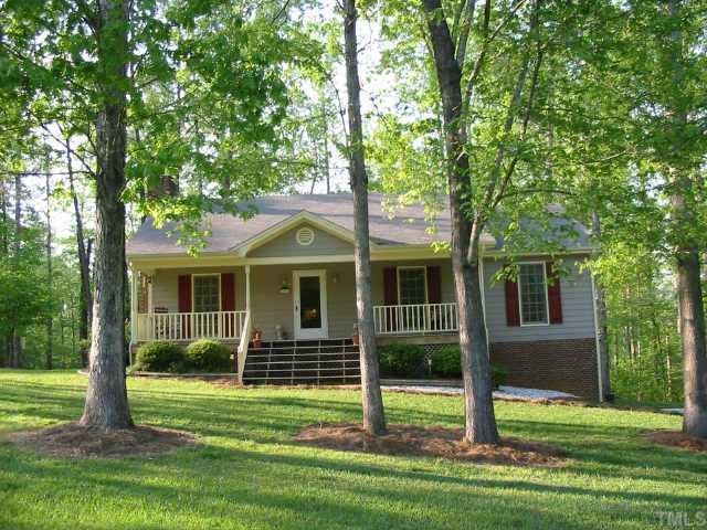 2021 Hilly Ridge Raleigh, NC 27603 - Photo 1 of 1 a view of a house with a yard and plants