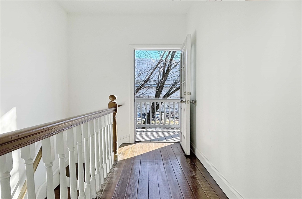 173 Walnut Street, Unit 3 Chelsea, MA 02150 - Photo 9 of 12 a view of entryway with wooden floor