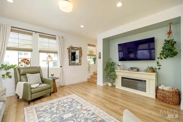 715 Rockview Road Novato, CA 94949 - Photo 5 of 36 Entertainment Wall with electric fireplace for warmth and added ambiance.