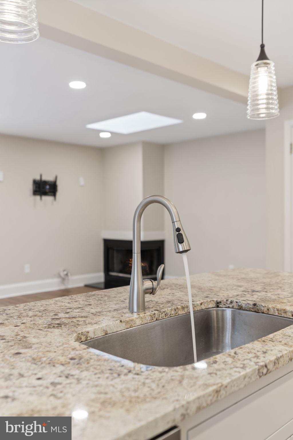 115 Roumfort Road, Unit 26 Philadelphia, PA 19119 - Photo 13 of 33 a view of a kitchen with a sink