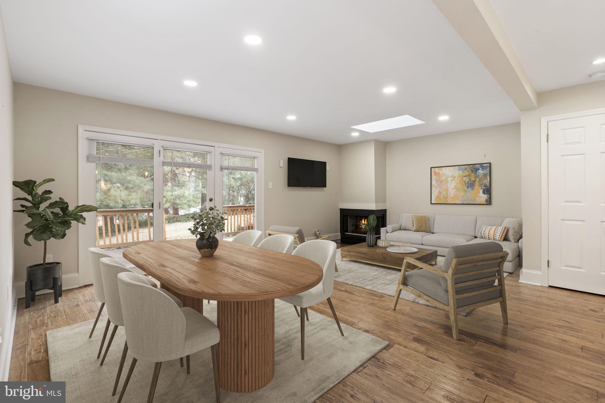 115 Roumfort Road, Unit 26 Philadelphia, PA 19119 - Photo 15 of 33 a view of a dining room with furniture window and wooden floor