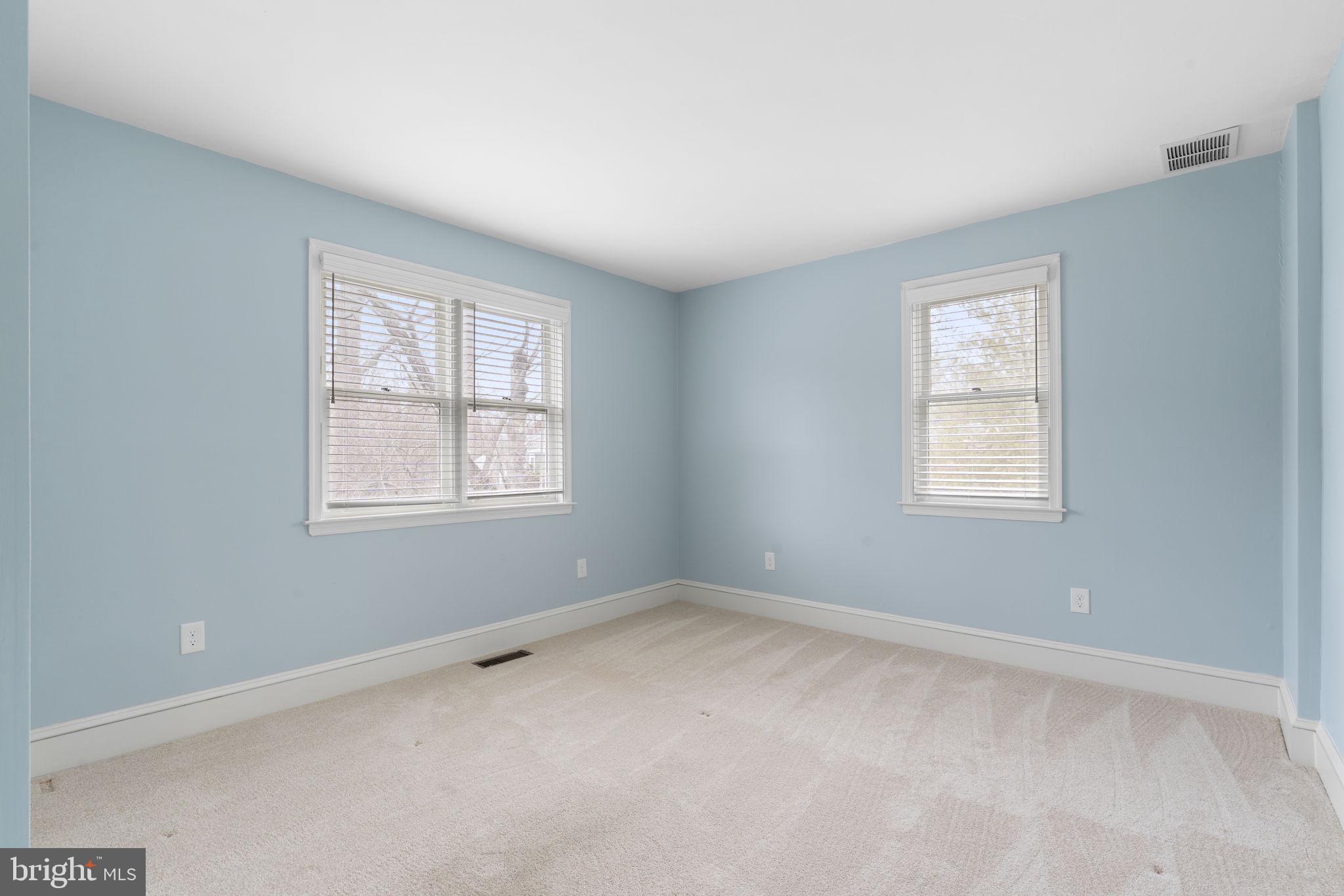 115 Roumfort Road, Unit 26 Philadelphia, PA 19119 - Photo 25 of 33 an empty room with a window