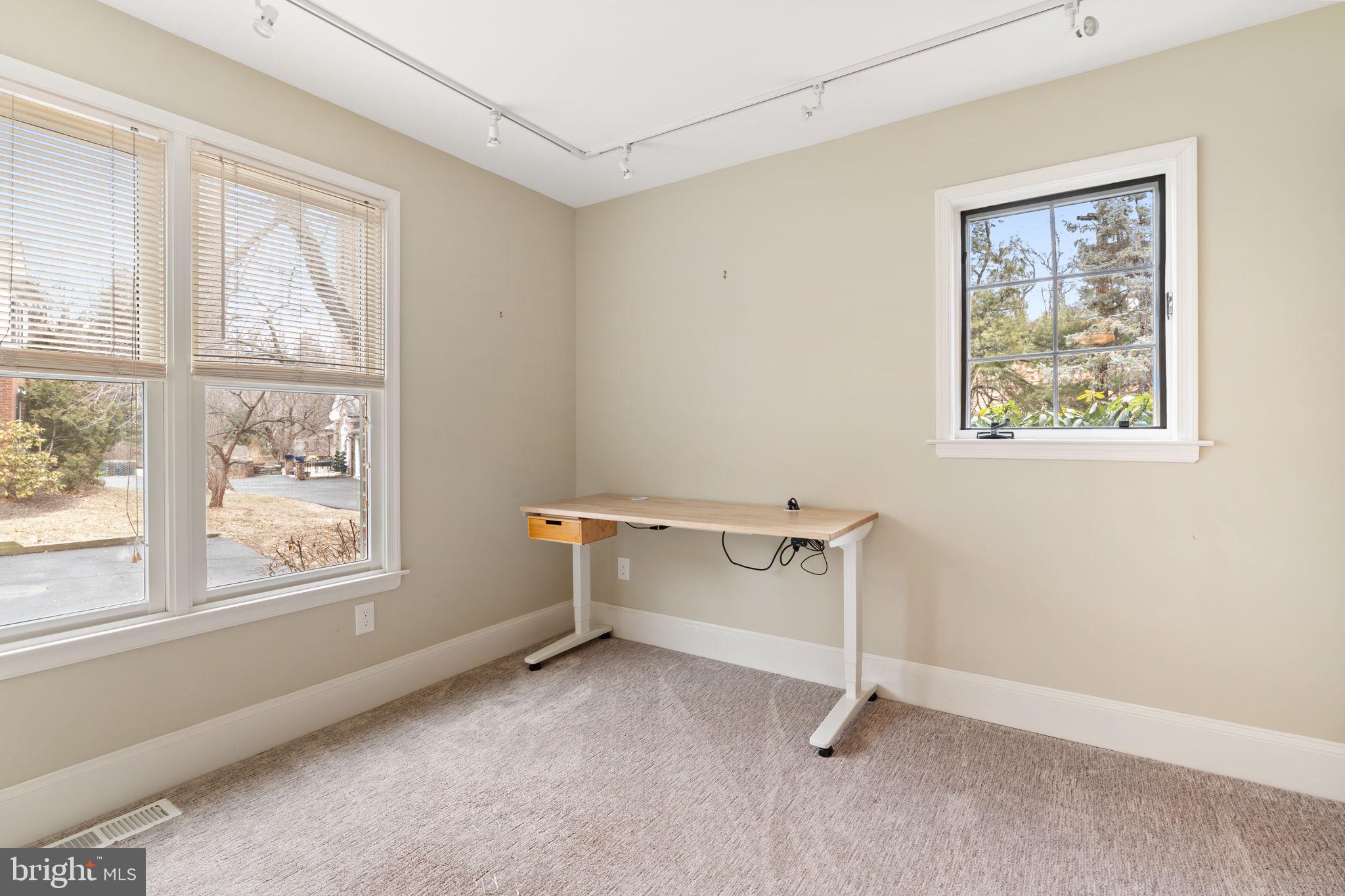 115 Roumfort Road, Unit 26 Philadelphia, PA 19119 - Photo 6 of 33 a view of room with window and a ceiling fan
