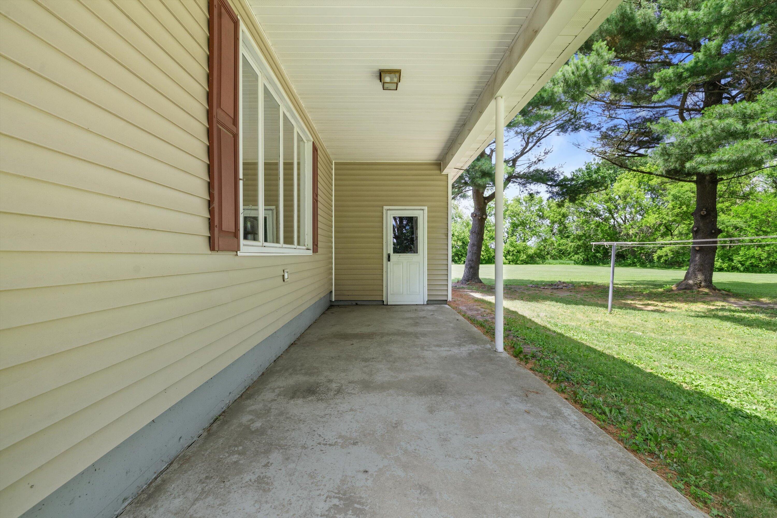 W3692 County Rd NN Geneva, WI 53121 - Photo 39 of 43 porch off back of garage
