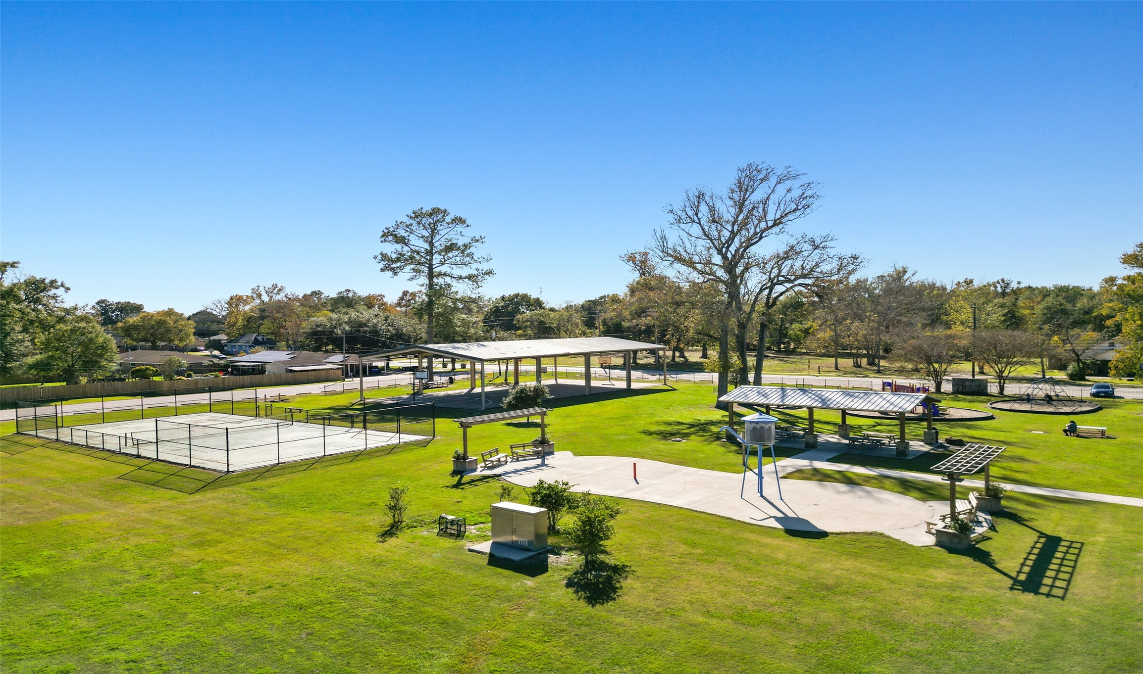 510 Samuel Rdg Drive Dayton, TX 77535 - Photo 29 of 33 Parker Park offers basketball courts, a pavilion, picnic tables, playground, splashpad and tennis courts.