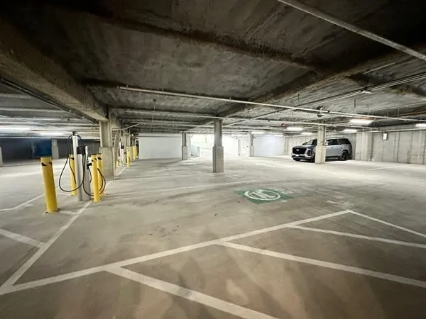 a view of a garage with wooden floor