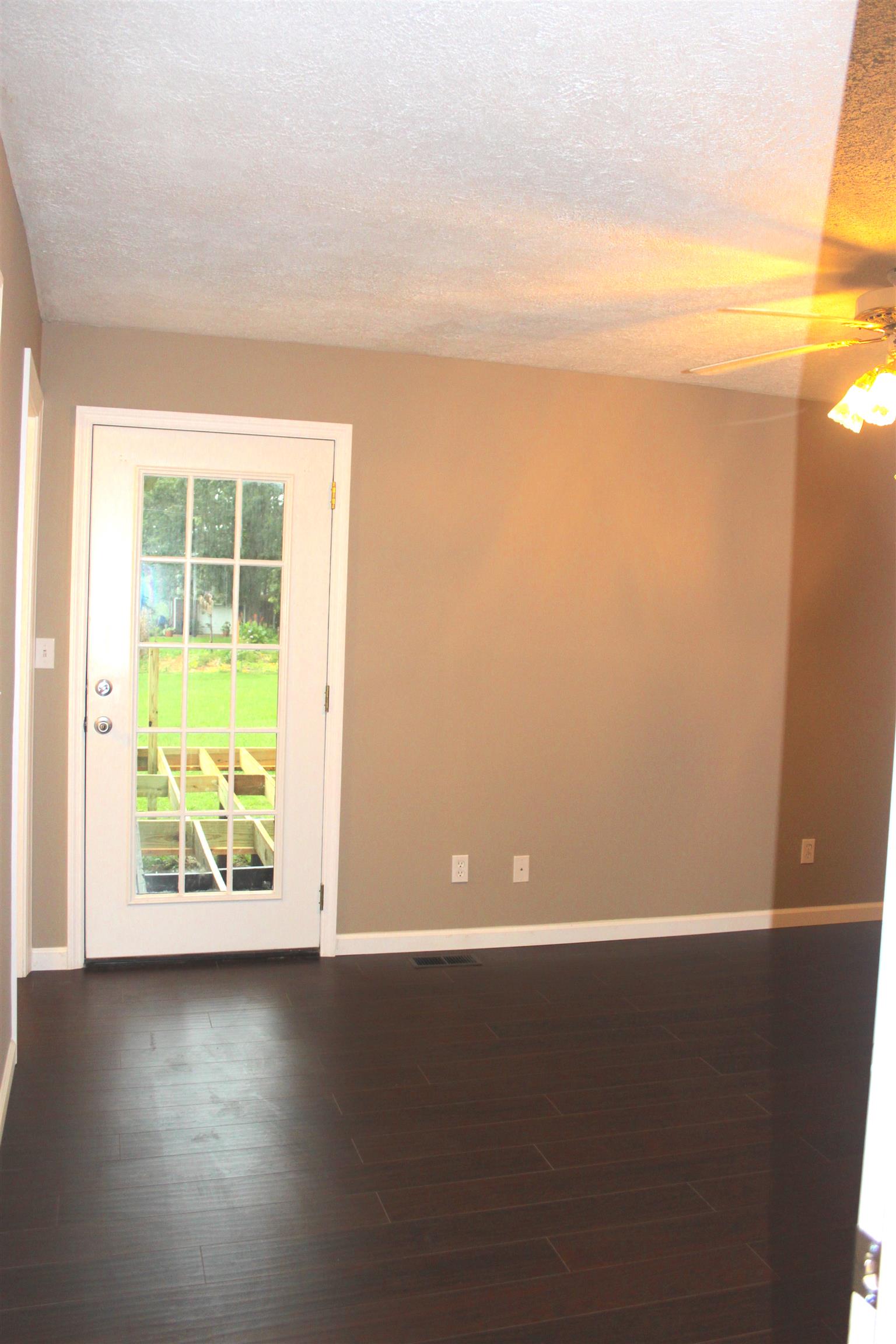 2759 Heights Circle Road Greenbrier, TN 37073 - Photo 16 of 30 an empty room with wooden floor and windows