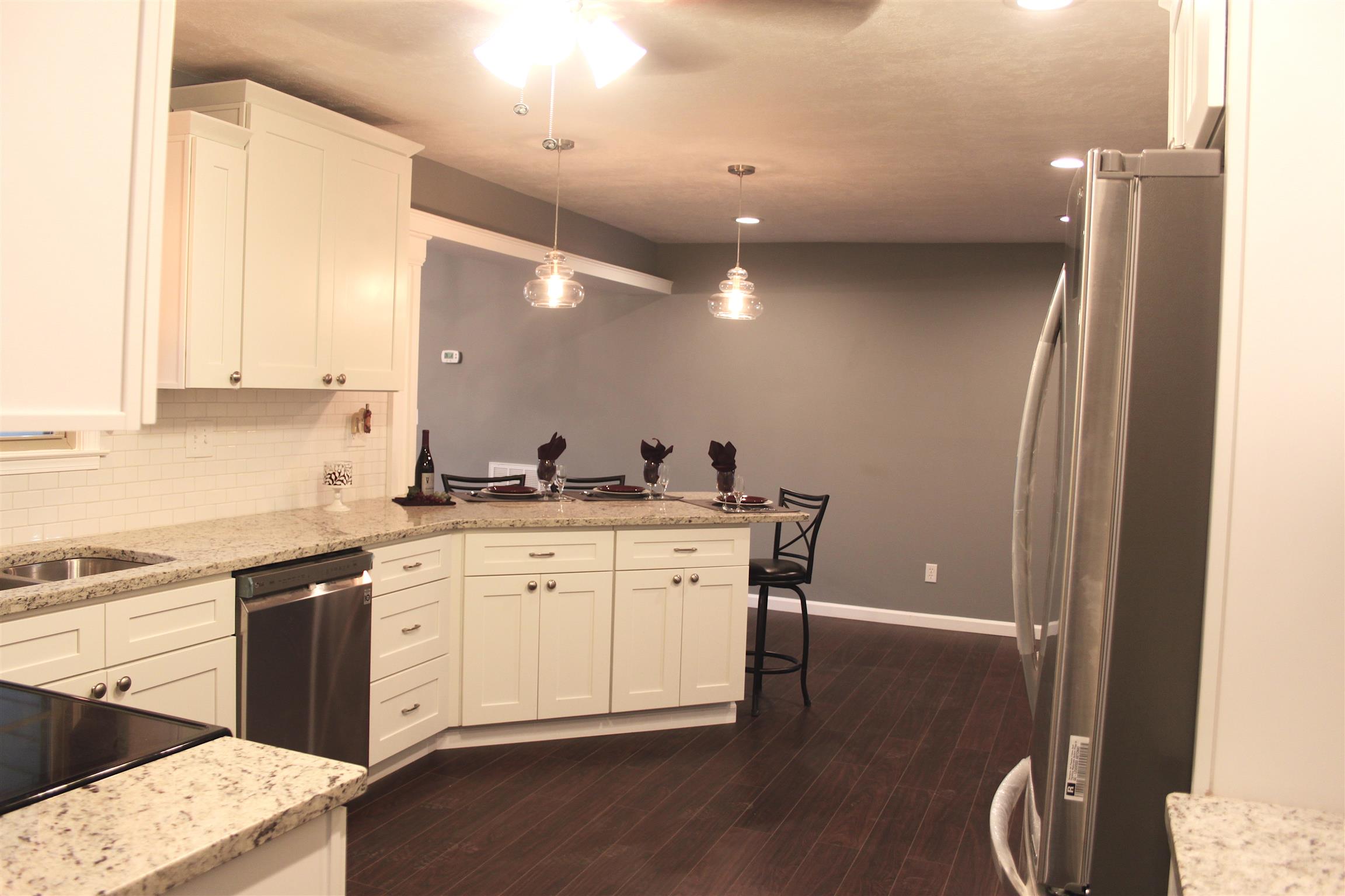 2759 Heights Circle Road Greenbrier, TN 37073 - Photo 5 of 30 a kitchen with a sink cabinets and wooden floor