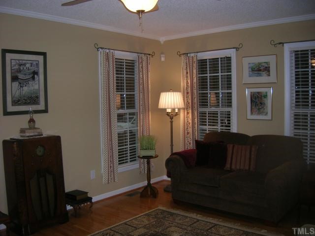 640 Lanes Mill Road Bennett, NC 27208 - Photo 4 of 12 a living room with furniture and windows
