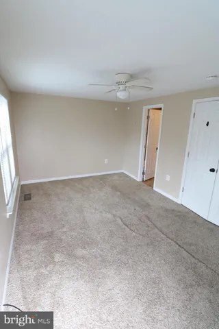 an empty room with a natural light