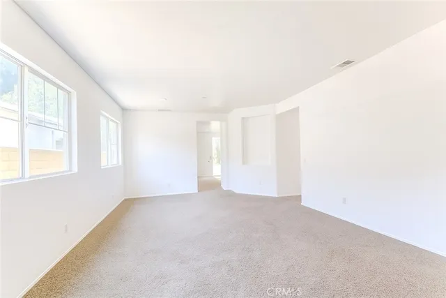 a view of an empty room with window