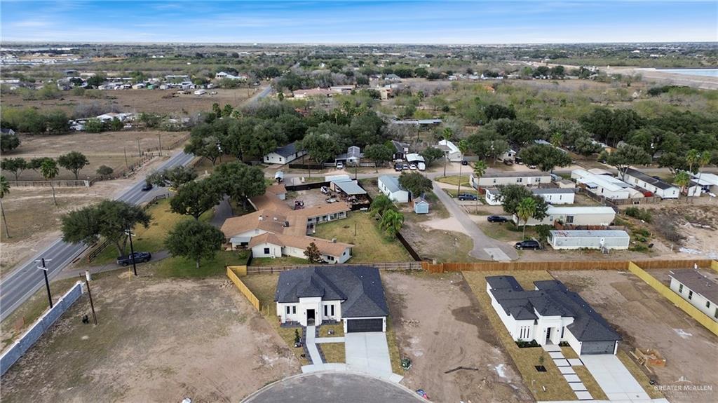 5100 Duke Avenue McAllen, TX 78504 - Photo 22 of 24 an aerial view of a city with lots of residential buildings